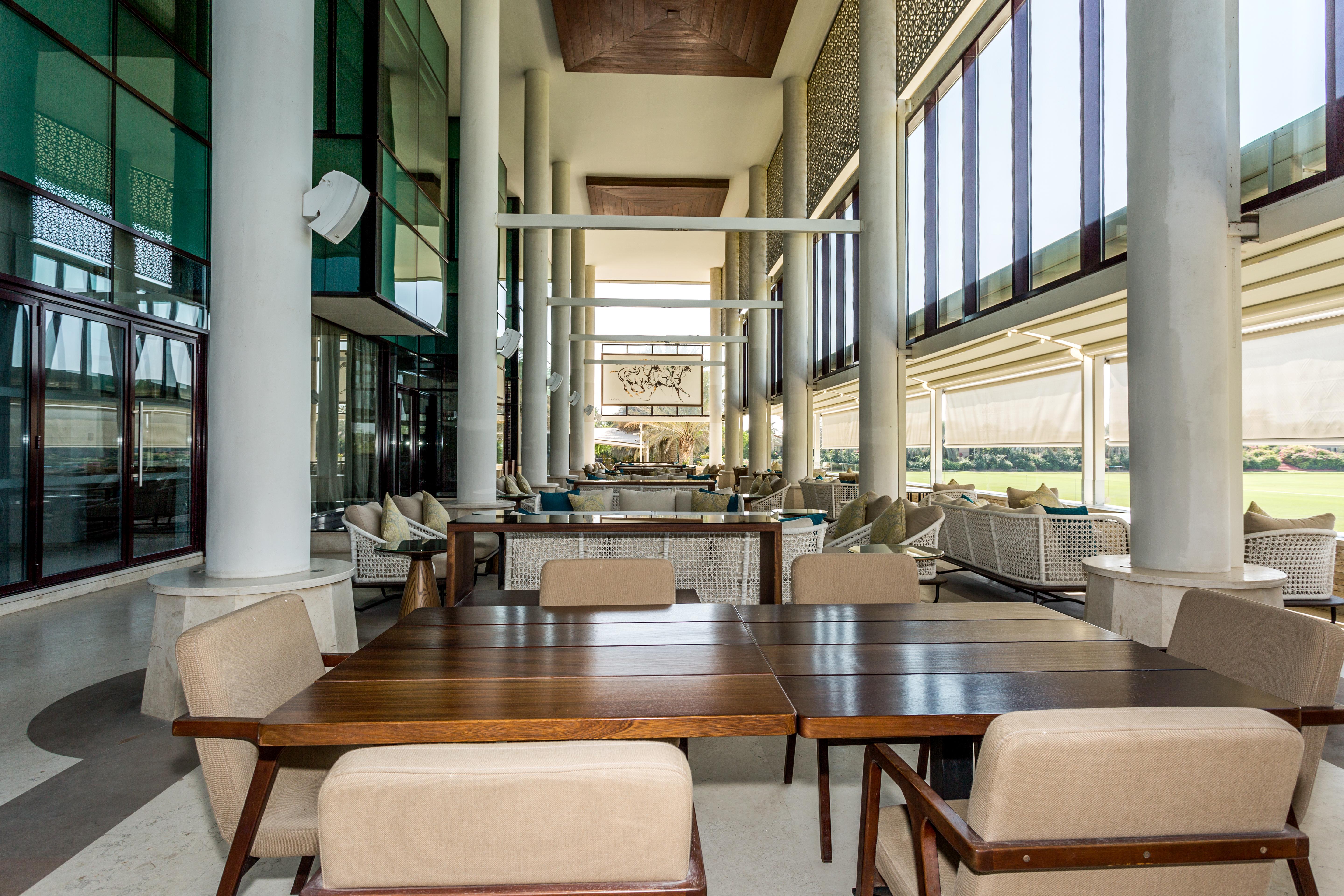 Melia Desert Palm Member Of Melia Collection Dubai Exterior photo The interior of the clubhouse at the Abu Dhabi Golf Course