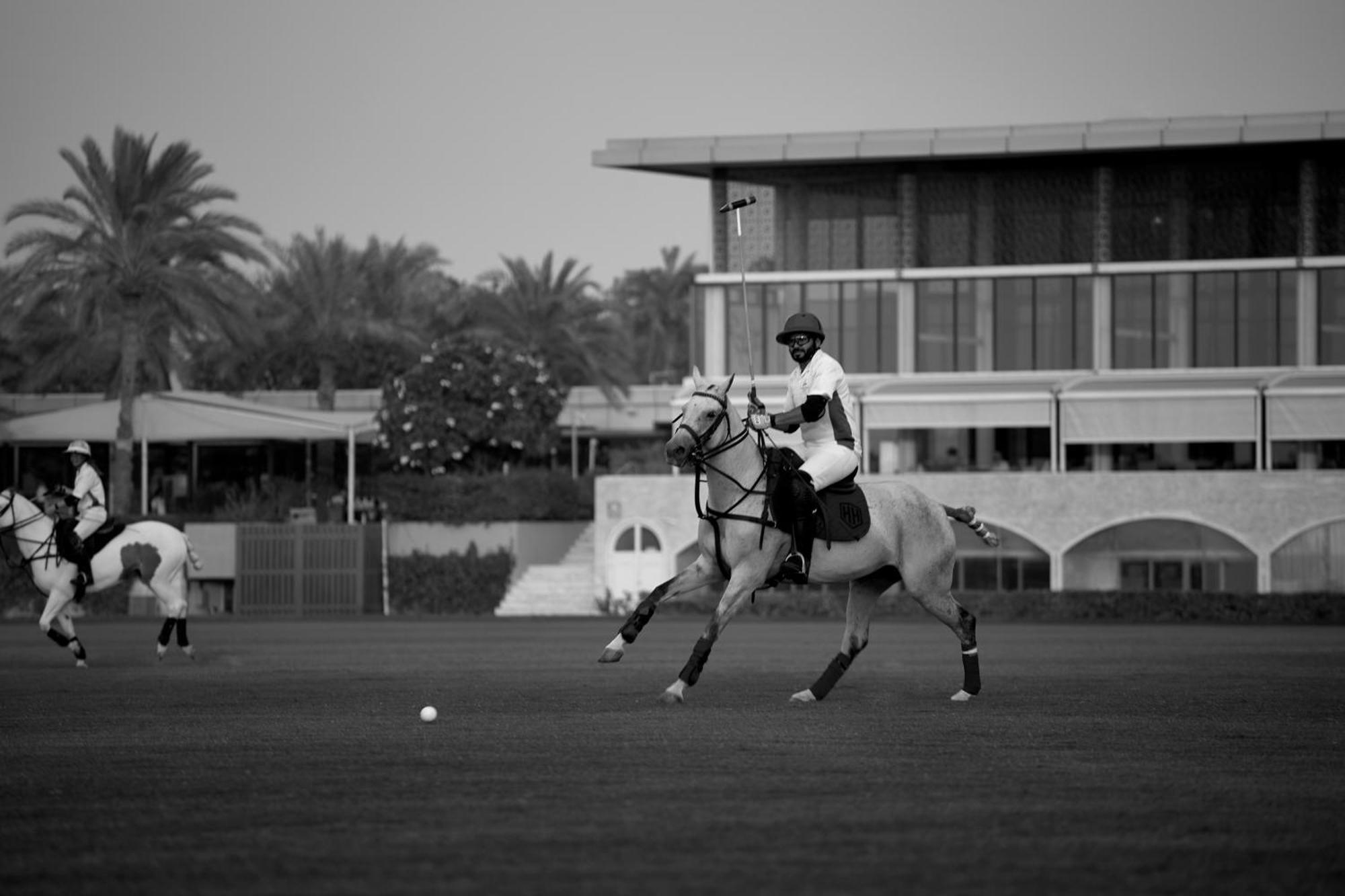 Melia Desert Palm Member Of Melia Collection Dubai Exterior photo A horse polo player